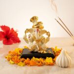 Gold Resin Ganesha Idol Sitting on Base for Home & Office